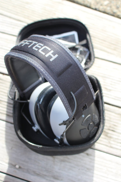 Mufftech Double OG Bluetooth earmuffs packed inside included rugged hard carry case