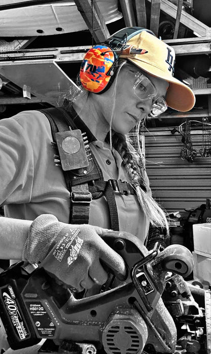 Construction worker on scaffolding wearing Mufftech Orange Roughy Class 5 hearing protection